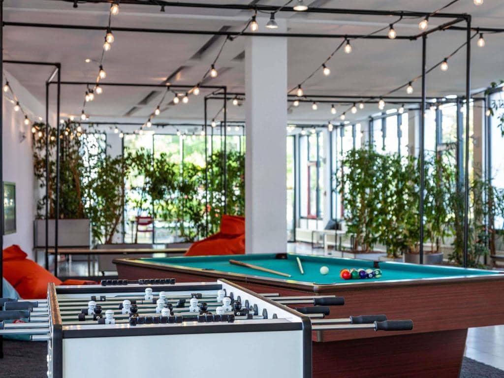 Küche, Garten, Wäschebereich, Play Area und Coworking.
